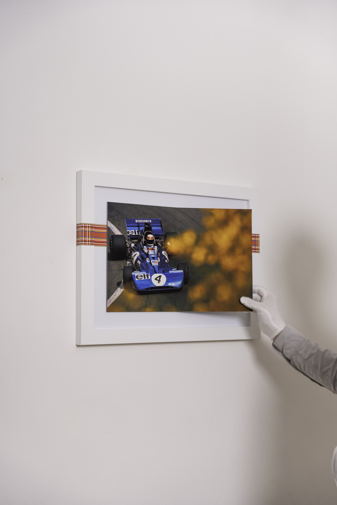 Page turn, 3 of 5. Open at a colour spread of Stewart's blue number 4 car.